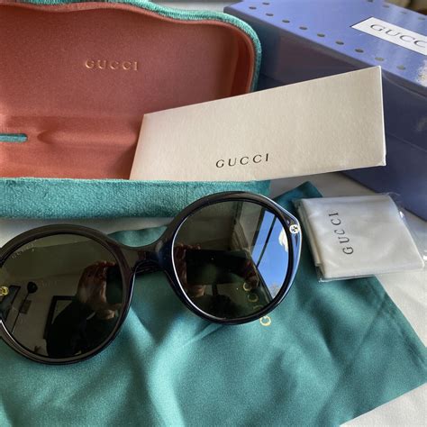 gucci gg0023s 001 black round sunglasses